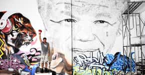 Artista reproduz rosto de Nelson Mandela usando luvas de boxe e os carácteres 自由, livre em mandarim