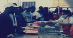 Instituição beneficente oferece refeições a haitianos refugiados