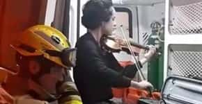 Mulher sofre acidente e, em agradecimento, toca violino para bombeiros