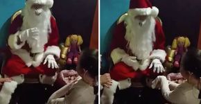 Papai Noel conversa com menina surda usando língua de sinais