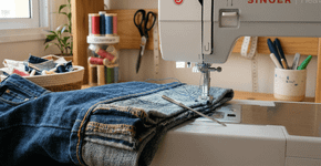 O que faz a agulha da máquina de costura quebrar quando você tenta fazer a barra de uma calça jeans