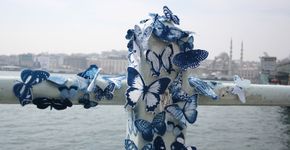 Borboletas azuis colorem as ruas do mundo, nos 7 continente