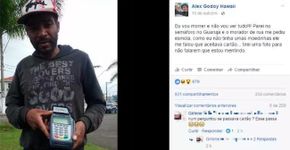 Morador de rua pede esmola com máquina de cartão