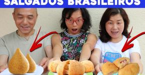 Garoto chinês experimenta doces brasileiros