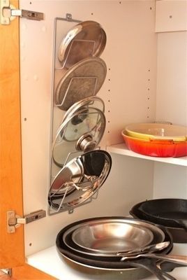 Estante para tampas de panela.