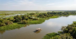 Uma viagem fluvial de 150 quilômetros pelo rio Cuiabá ou 230 quilômetros pelo rio Paraguai: o parque pantaneiro ampliado em 2026 para 183.095 hectares onde a visitação ainda exige autorização prévia