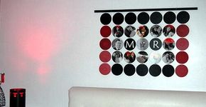 Faça um painel de fotos com CDs usados