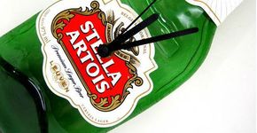 Relógio feito com suporte de garrafa – R$ 45