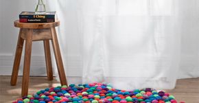 Faça você mesmo um tapete de pompons de lã para o inverno