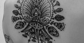 35 ideias de tatuagens para as costas femininas