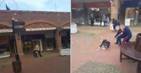 Homem sobe em telhado de shopping e joga dinheiro