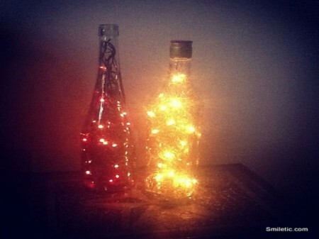 Luminária de vidro verde ainda com rolha e luzes brancas por R