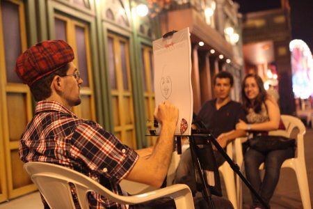 Cartunistas na Rock Street fazem caricaturas e graça