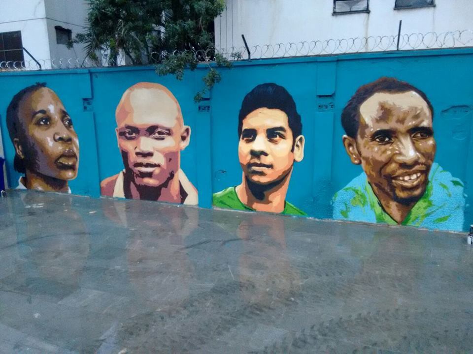 O mural reúne retratos dos dez atletas refugiados que participaram da Olimpíada