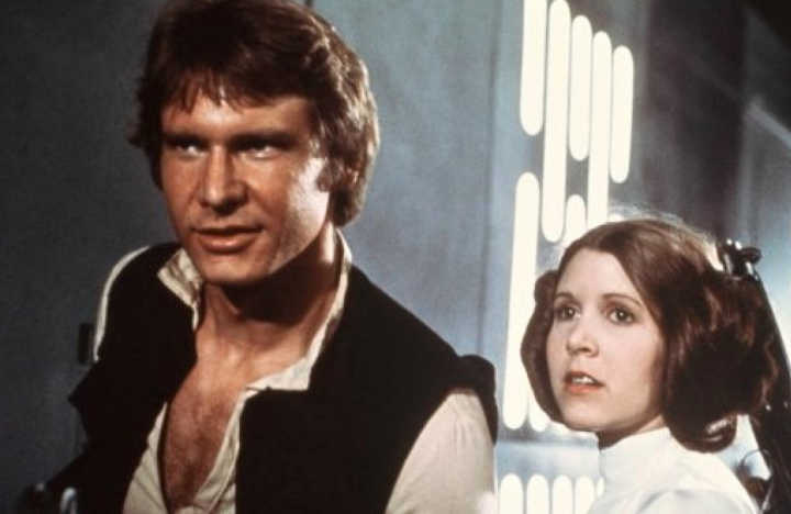 Harrison Ford e Carrie Fisher como Han Solo e Leia Organa