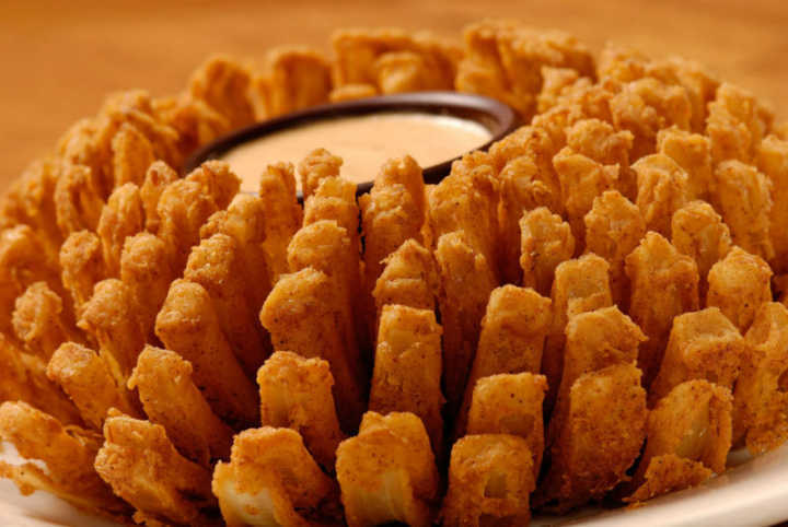 Adquira o voucher e ganhe gratuitamente a Bloomin’ Onion