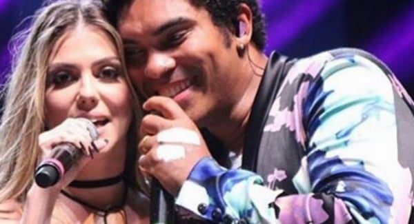 A cantora Millane Hora e o cantor Deny da Timbalada