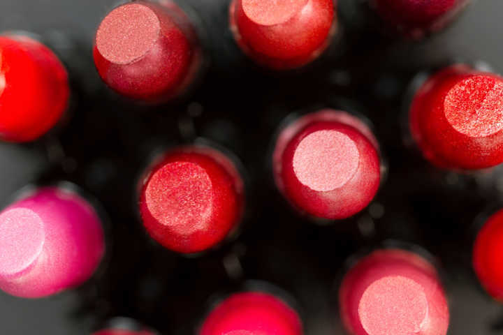 Red lipsticks set close up.