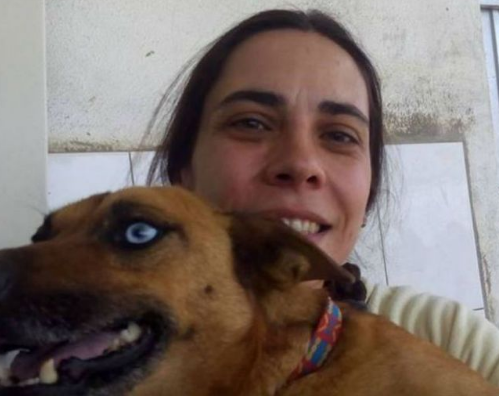 Liliana e seu pai protegeram os 80 cães do abrigo durante um incêndio (Foto: Divulgação/Arquivo Pessoal)