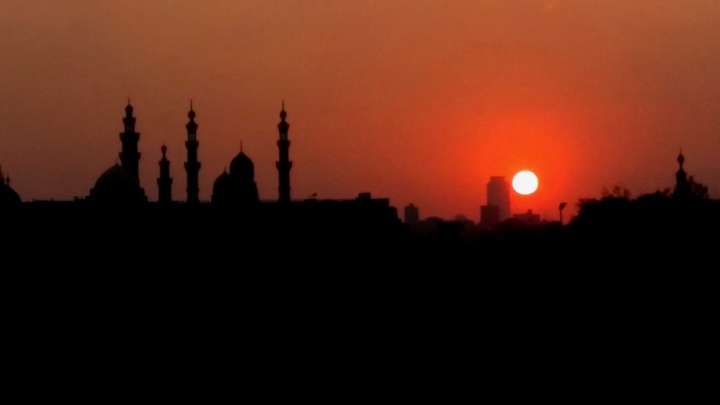 Pôr-do-sol no Cairo. Ao fundo, a Cidadela de Saladino