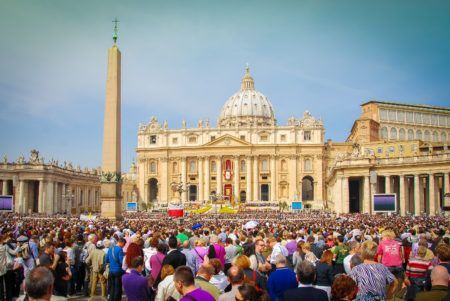 Rome, Italy – April 24, 2011: Crowds gather outside St. Peter’s Basillica in Rome to hear the Pope speak on Easter Sunday.