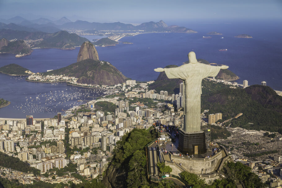 Rio De Janeiro, Brazil – February 11, 2015: Rio de Janeiro, Brazil : Aerial view of Christ and Botafogo Bay from high angle. Statue is located on Corcovado Hill and is facing the city and Guanabara Bay.