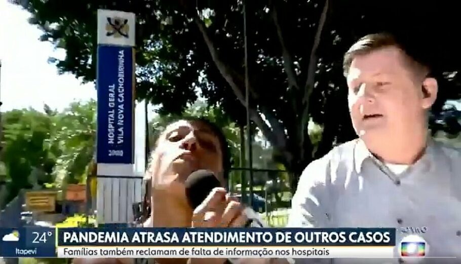 O jornalista Renato Peters, da Globo, é atacado por mulher durante reportagem