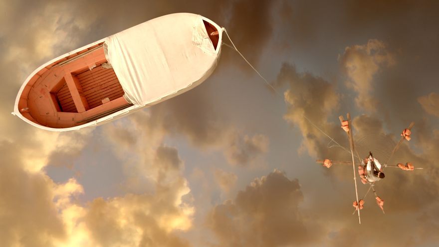 cena do filme A Vida de Pi; barco no mar com reflexo do céu