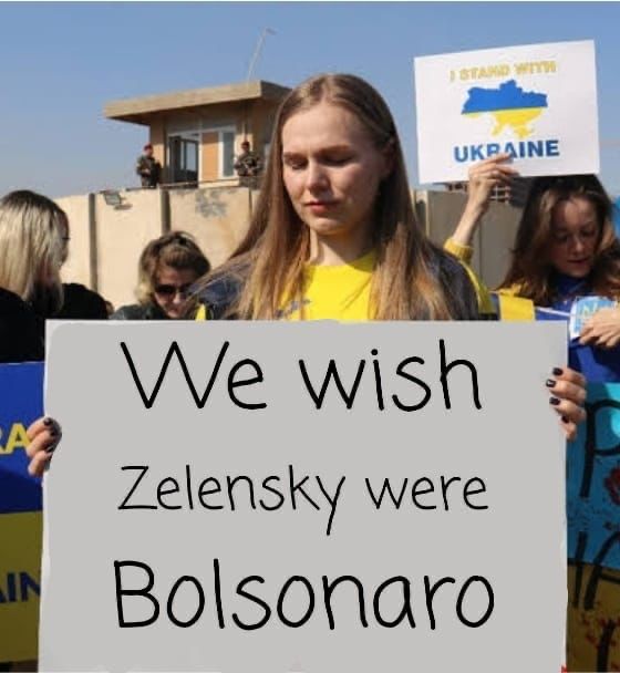 “Nós gostaríamos que Zelensky fosse Bolsonaro”, diz o cartaz; Putin também queria