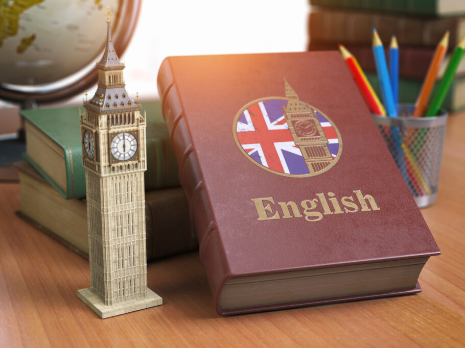 Studying and learn English concept. Book with flag of Great Britain and Big Ben tower on the table. 3d Iluustration