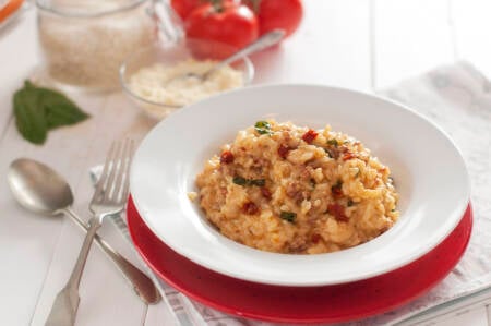 Risoto de tomate seco com rúcula