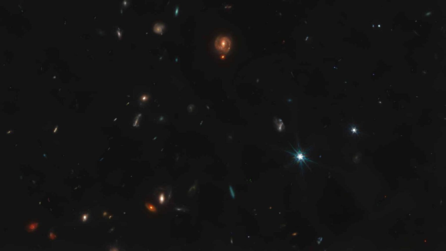 E se algumas das luzes mais estranhas do universo primitivo não fossem galáxias gigantes e impossíveis, mas buracos negros jovens escondidos à vista de todos