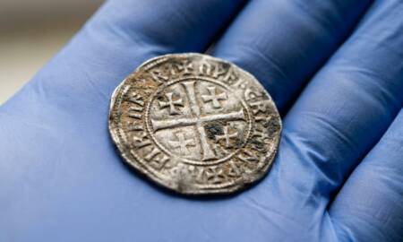 researcher-holding-medieval-silv-450x270.jpg