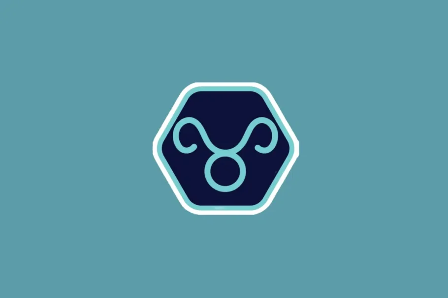 Ilustração minimalista do símbolo do signo de touro em tom azul-claro, centralizada dentro de um hexágono azul-escuro com borda branca e azul. O fundo da imagem é em um tom sólido de azul-turquesa