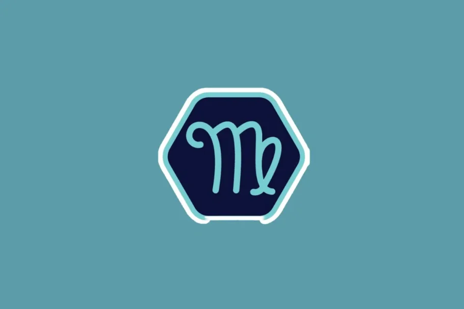 Ilustração minimalista do símbolo do signo de virgem em tom azul-claro, centralizada dentro de um hexágono azul-escuro com borda branca e azul. O fundo da imagem é em um tom sólido de azul-turquesa